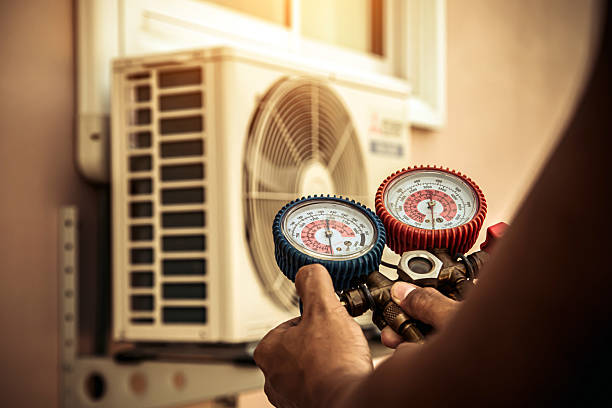 Professional Hvac Maintenance technician working in Bogota, TN